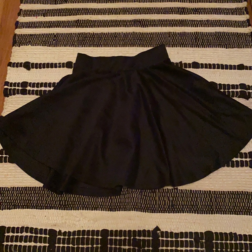 Black dress up skirt. Can wear ask reg skirt tho!